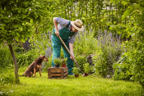 Gardening team applying health and safety controls at the start of a job